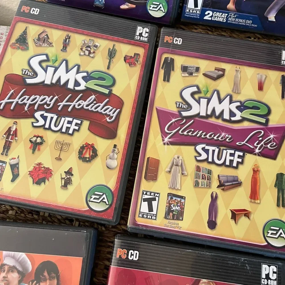 The SIMS PlayStation Vintage Side Video Game Lot PC DVD Pets Family Delux Sets